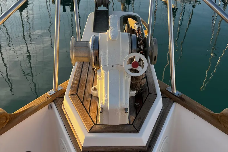 Apta Yacht Photos Pics Bow of 1989 Grand Banks 36 Classic yacht with anchor winch and teak decking.