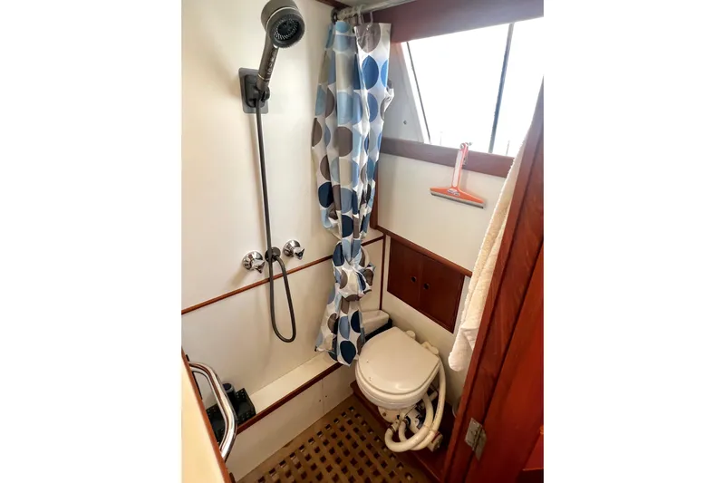 Apta Yacht Photos Pics Bathroom of 1989 Grand Banks 36 Classic yacht with shower and toilet.