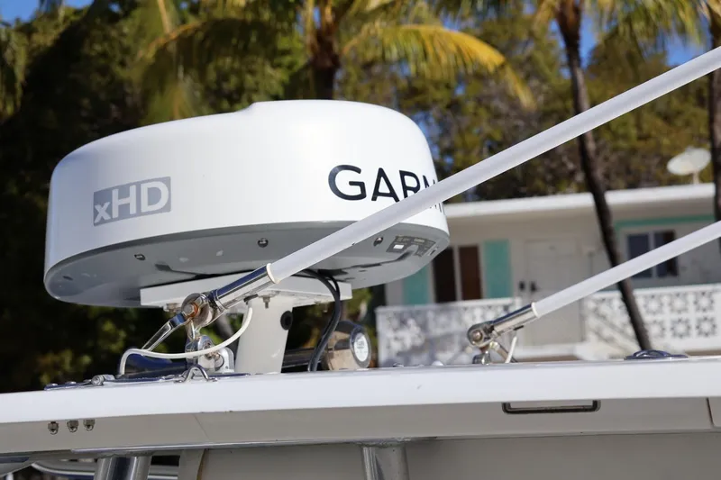  Yacht Photos Pics Garmin xHD radar on 2007 Contender 33 Tournament boat, with palm trees in background.