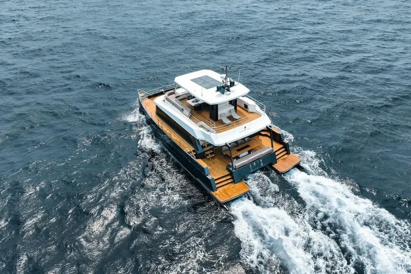  Yacht Photos Pics 2025 GZ Yachts TY560 cruising on open sea, showcasing luxury design and craftsmanship.