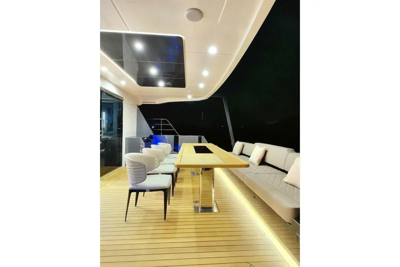  Yacht Photos Pics Luxurious 2025 GZ Yachts TY560 deck with elegant seating and ambient lighting.