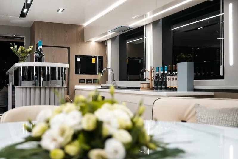  Yacht Photos Pics Luxurious interior of 2025 GZ Yachts TY560 with modern kitchen and elegant decor.