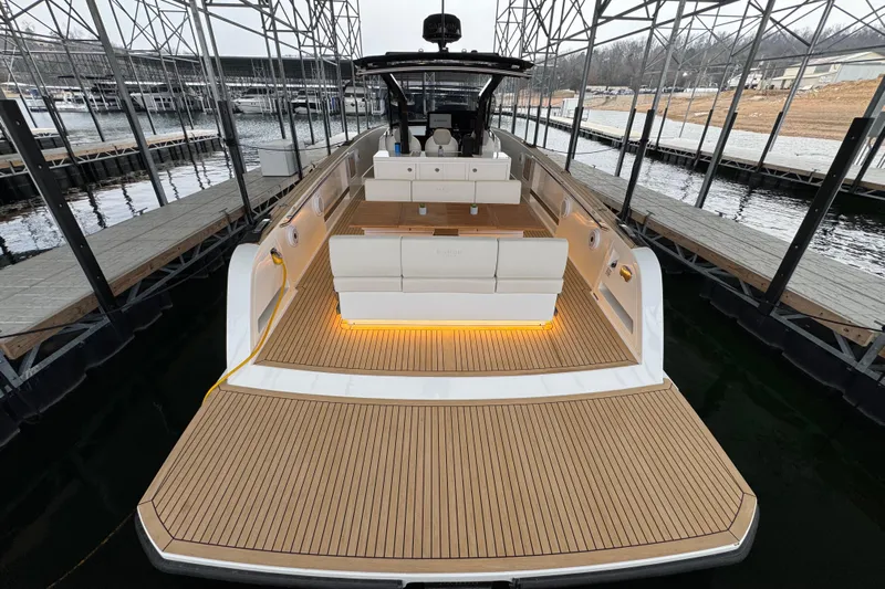  Yacht Photos Pics 2025 Pardo Yachts P38 luxury yacht with spacious deck and elegant seating in marina.