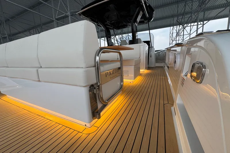  Yacht Photos Pics 2025 Pardo Yachts P38 with illuminated deck and luxurious seating under a covered area.