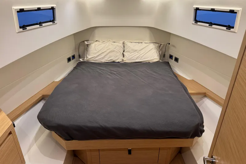  Yacht Photos Pics Interior cabin of 2025 Pardo Yachts P38, featuring a cozy bed and modern design.