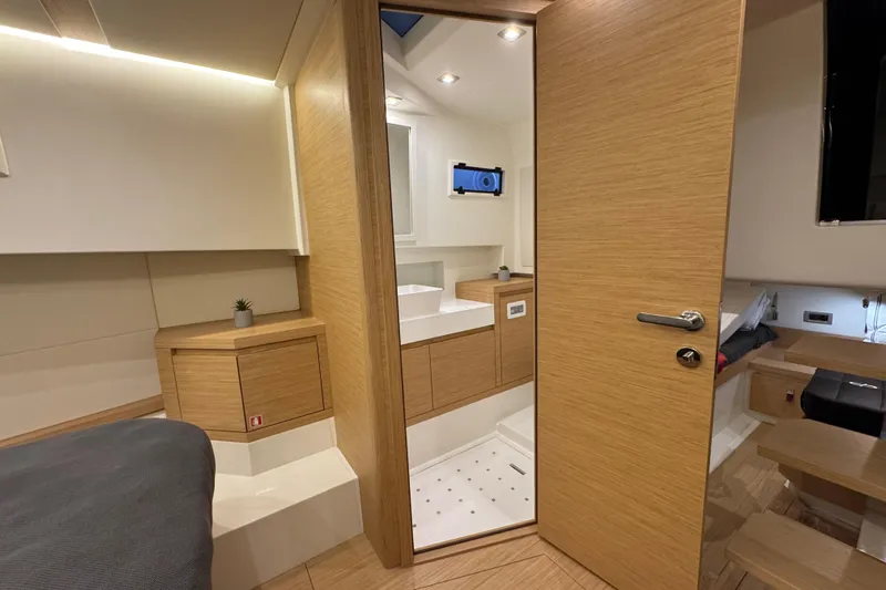  Yacht Photos Pics Luxurious interior of 2025 Pardo Yachts P38, featuring modern wood finishes and sleek design.