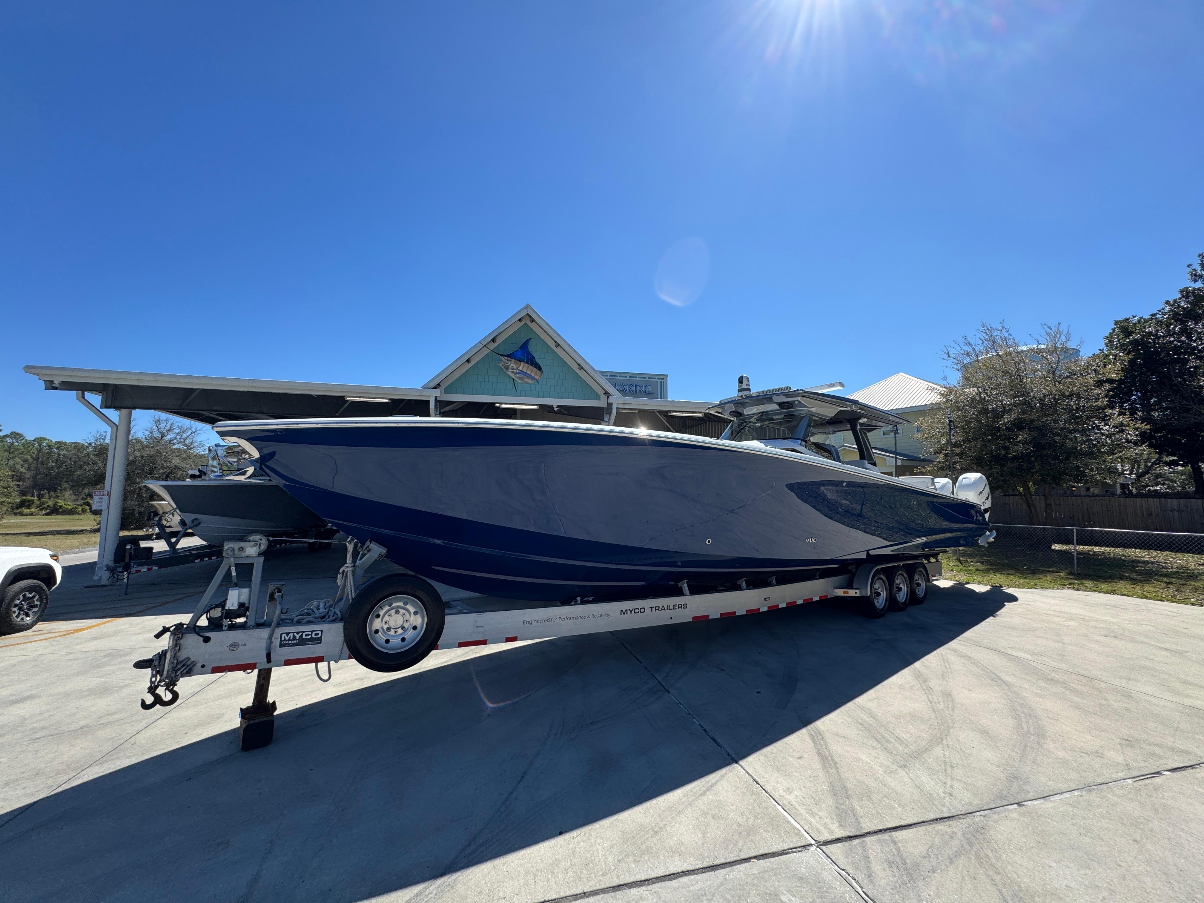 2018 Nor-Tech 452 Super Fish boat on trailer under clear blue sky.