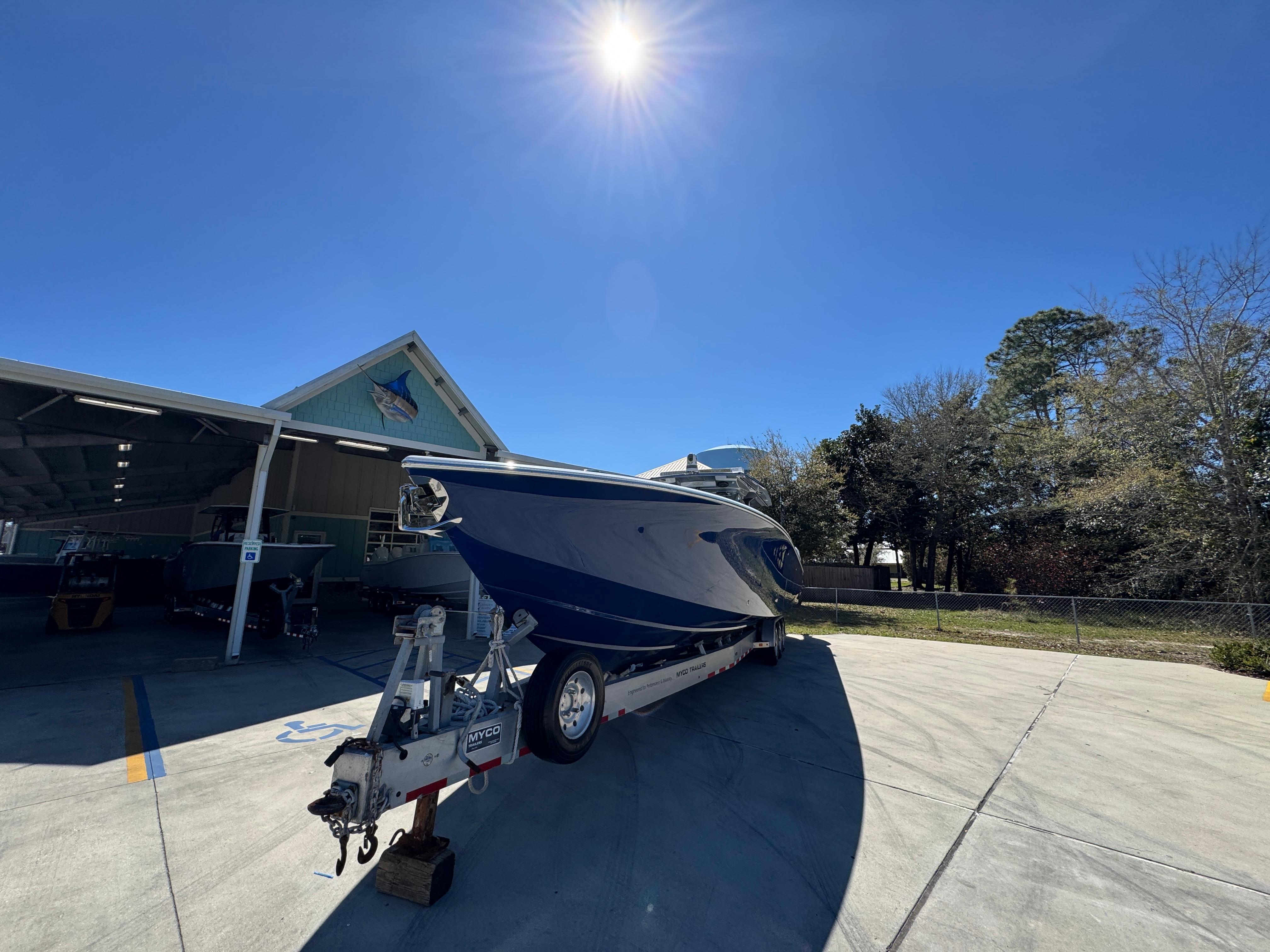 2018 Nor-Tech 452 Super Fish boat on trailer under clear blue sky.