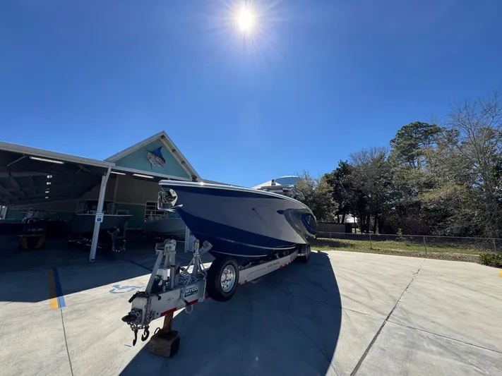  Yacht Photos Pics 2018 Nor-Tech 452 Super Fish boat on trailer under clear blue sky.