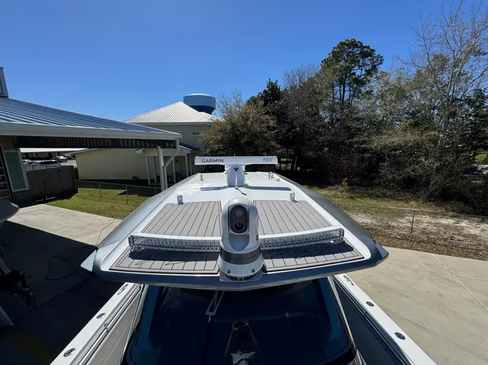  Yacht Photos Pics 2018 Nor-Tech 452 Super Fish boat with Garmin equipment, docked outdoors.