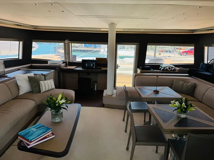  Yacht Photos Pics Luxurious interior of 2024 Lagoon 65 yacht with elegant seating and decor.