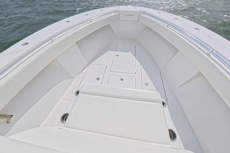  Yacht Photos Pics 2019 SeaHunter 33 Tournament boat deck with sleek white design on open water.