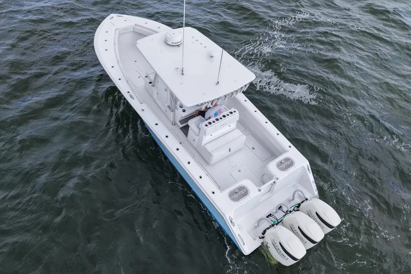  Yacht Photos Pics 2019 SeaHunter 33 Tournament boat on water, aerial view, triple engines.