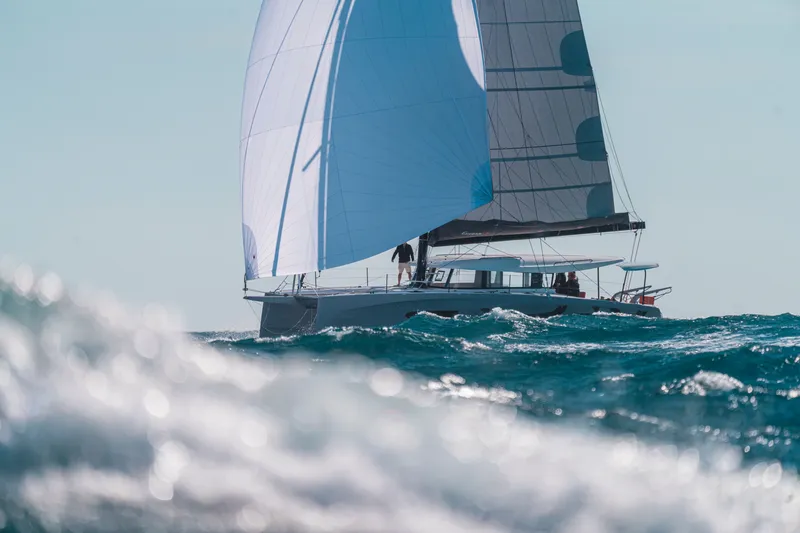 Tbd Yacht Photos Pics 2026 Excess 13 sailing catamaran on open sea.