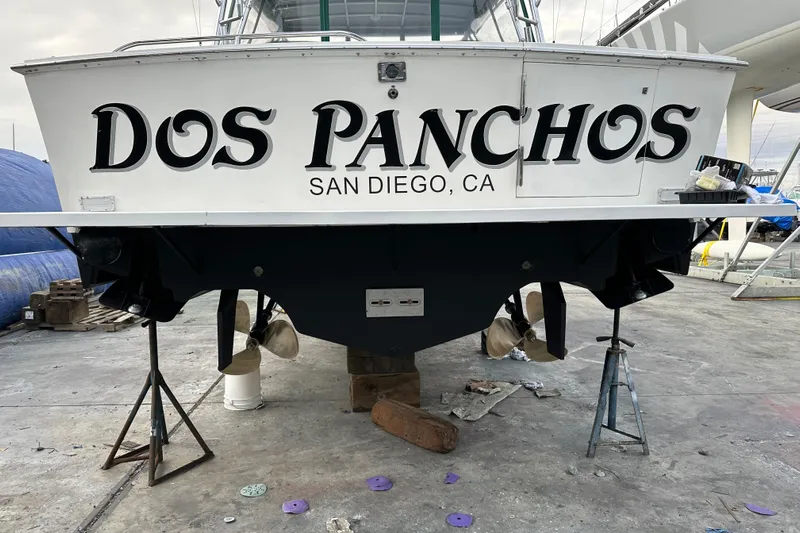 Dos Panchos Yacht Photos Pics 1997 Cabo 35 Express boat named "Dos Panchos" in San Diego, CA, on dry dock.