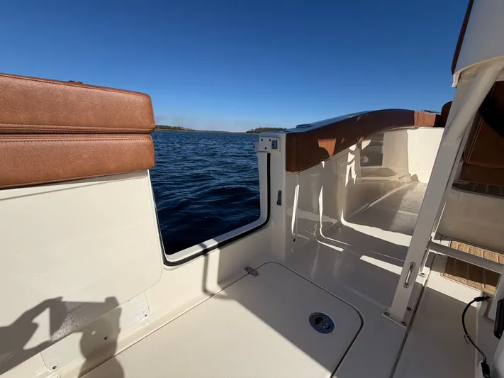  Yacht Photos Pics Interior view of 2026 Scout 277 LXF yacht on open water.