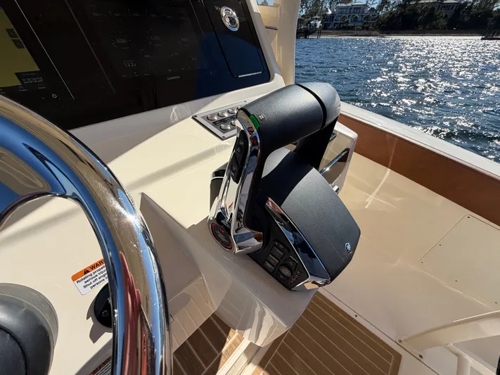  Yacht Photos Pics Steering console of Scout 277 LXF boat, 2026 model, on the water.