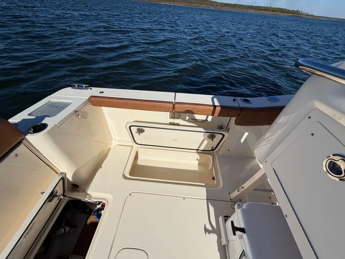  Yacht Photos Pics Interior view of 2026 Scout 277 LXF boat on the water.
