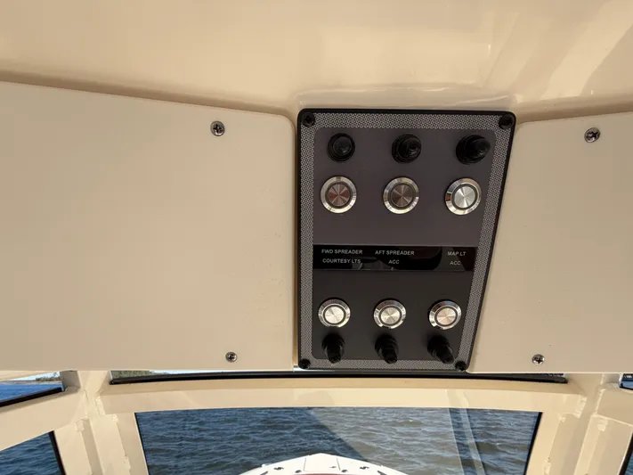  Yacht Photos Pics Control panel of Scout 277 LXF 2026 boat with switches.
