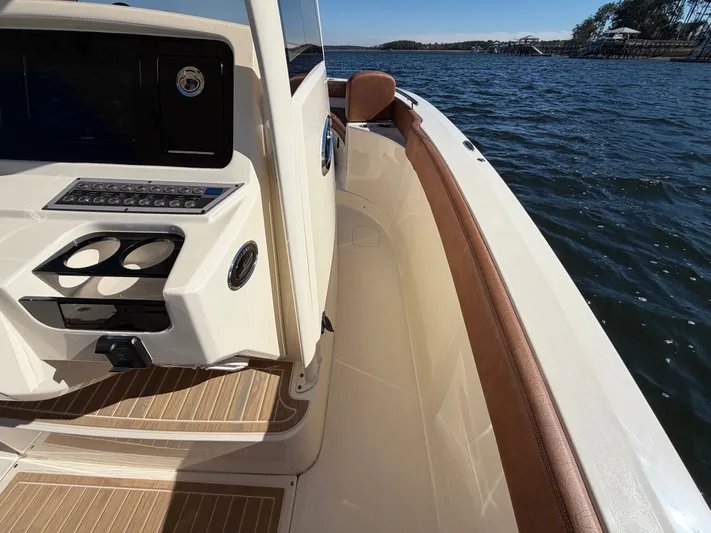  Yacht Photos Pics Interior view of Scout 277 LXF boat, 2026 model, on the water.