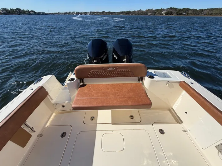  Yacht Photos Pics Scout 277 LXF 2026 boat with dual engines on open water.