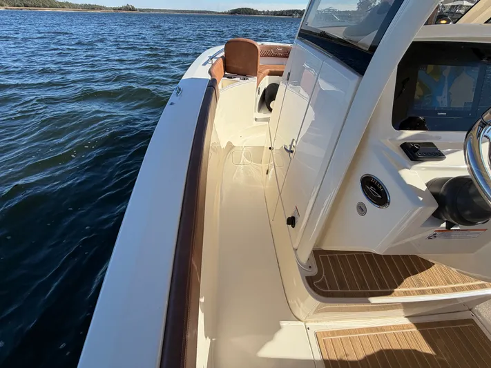  Yacht Photos Pics Scout 277 LXF 2026 boat on calm waters.