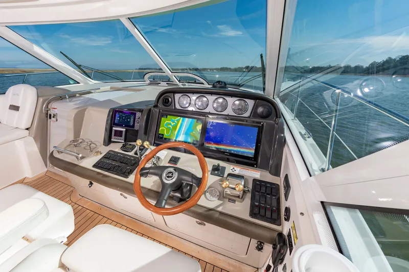 With E's Yacht Photos Pics Interior view of 2007 Sea Ray 48 Sundancer cockpit with modern navigation.