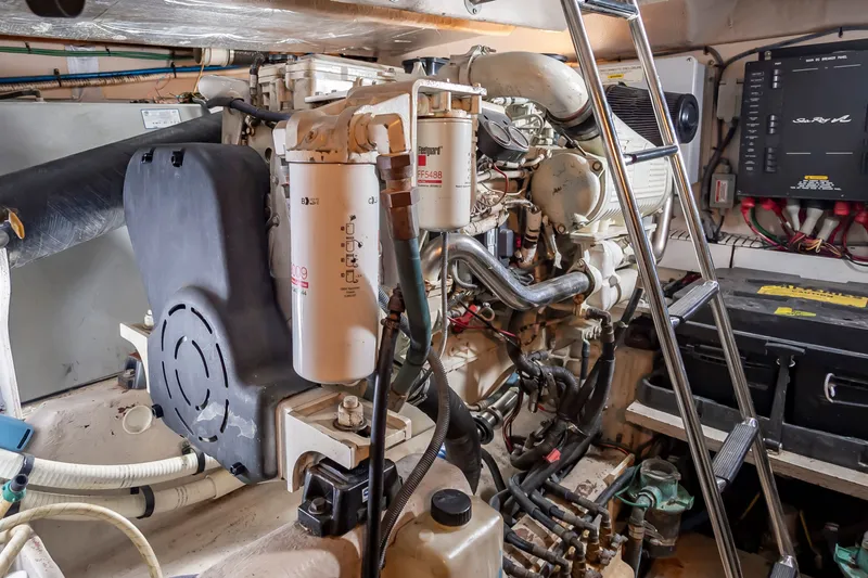 With E's Yacht Photos Pics Engine room of 2007 Sea Ray 48 Sundancer with ladders and hoses.