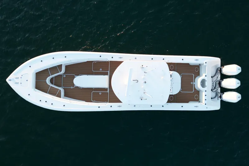  Yacht Photos Pics Aerial view of 2007 Yellowfin 36 Offshore boat with triple outboard engines.