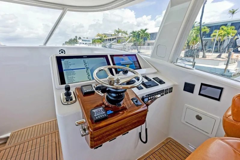  Yacht Photos Pics Helm station of 2020 Calcutta 480 Catamaran with modern navigation equipment.