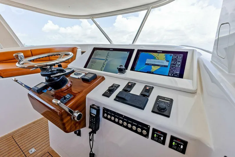  Yacht Photos Pics Calcutta 480 Catamaran 2020 helm station with navigation screens and controls.