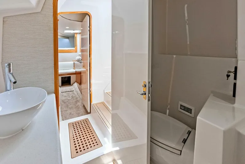  Yacht Photos Pics 2020 Calcutta 480 Catamaran interior with bathroom and cabin view.