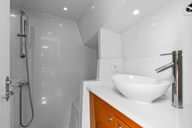  Yacht Photos Pics Modern bathroom in 2020 Calcutta 480 Catamaran with vessel sink and shower.
