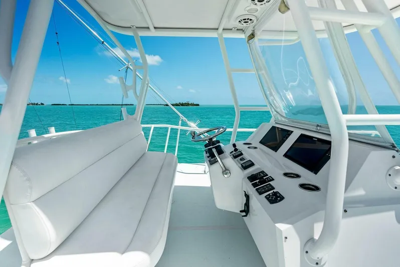  Yacht Photos Pics 2020 Calcutta 480 Catamaran helm with ocean view and white seating.