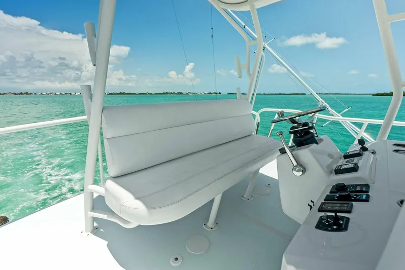  Yacht Photos Pics Calcutta 480 Catamaran 2020 model, white seating and control panel, cruising on turquoise waters.