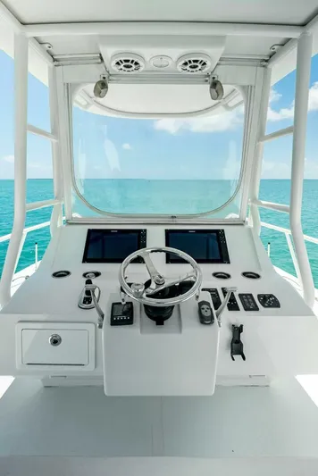  Yacht Photos Pics 2020 Calcutta 480 Catamaran helm station with dual screens and ocean view.