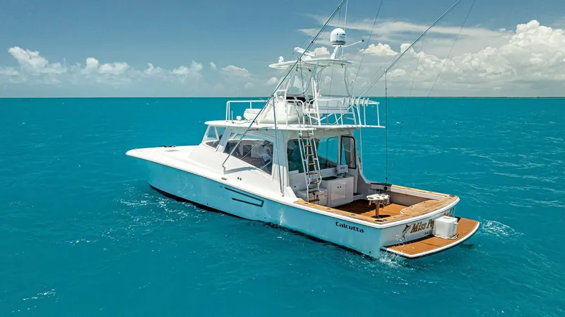  Yacht Photos Pics 2020 Calcutta 480 Catamaran on clear blue ocean waters.