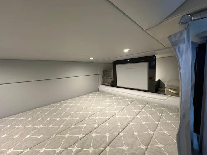  Yacht Photos Pics 2021 Formula 400 Super Sport Crossover cabin interior with bed and modern lighting.
