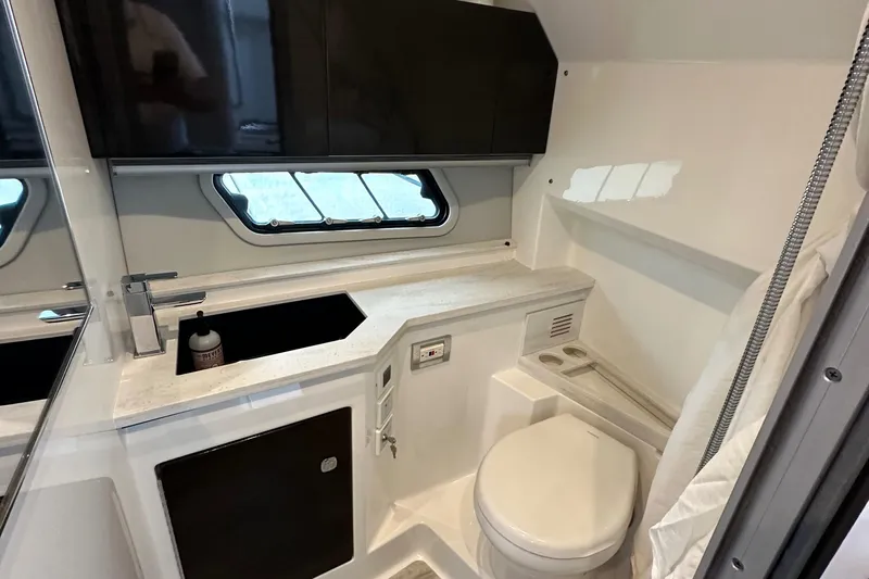  Yacht Photos Pics 2021 Formula 400 Super Sport Crossover bathroom with modern fixtures and sleek design.