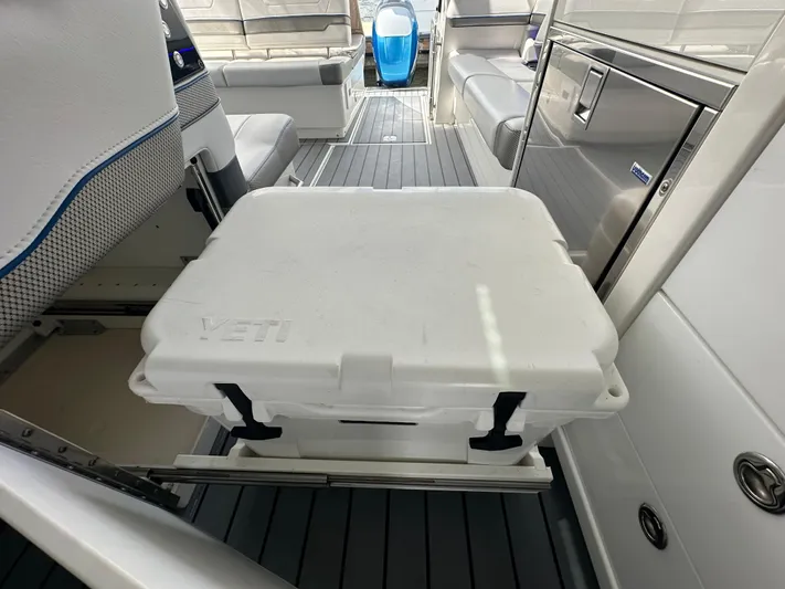  Yacht Photos Pics Interior of 2021 Formula 400 Super Sport Crossover with Yeti cooler and seating area.