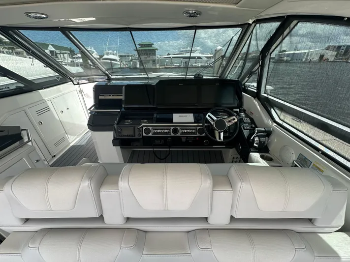  Yacht Photos Pics 2021 Formula 400 Super Sport Crossover cockpit with modern controls and luxurious seating.