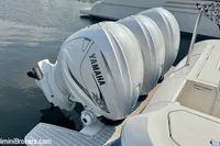 2023 Intrepid 41 Valor with Yamaha outboard engines, docked on calm water.