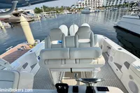 2023 Intrepid 41 Valor boat interior at marina, featuring luxurious seating and modern design.