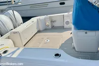 2023 Intrepid 41 Valor boat deck with seating and outboard motors.