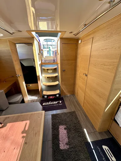 Hard Loaded Yacht Photos Pics 2024 Elan Impression 43 yacht interior with wooden finish and modern design.