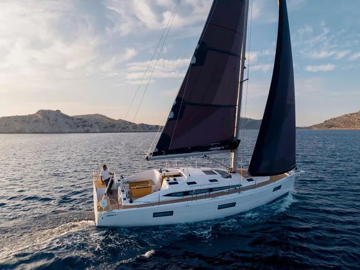 Hard Loaded Yacht Photos Pics 2024 Elan Impression 43 sailing yacht on open water.