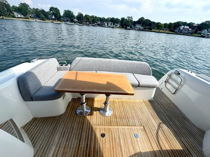 Mighty Mic Yacht Photos Pics Cockpit Looking Aft - Teak Decking & Wood Table