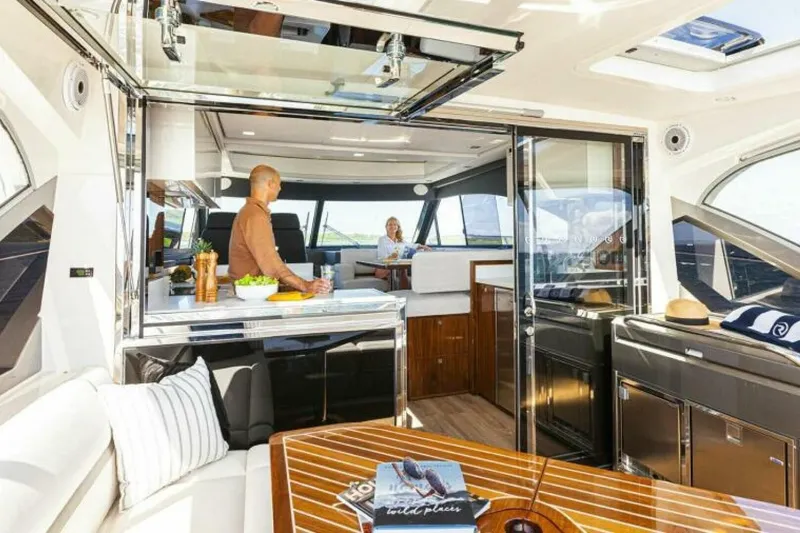  Yacht Photos Pics Luxurious interior of 2026 Riviera 4600 Sport Yacht Platinum Edition with modern amenities.