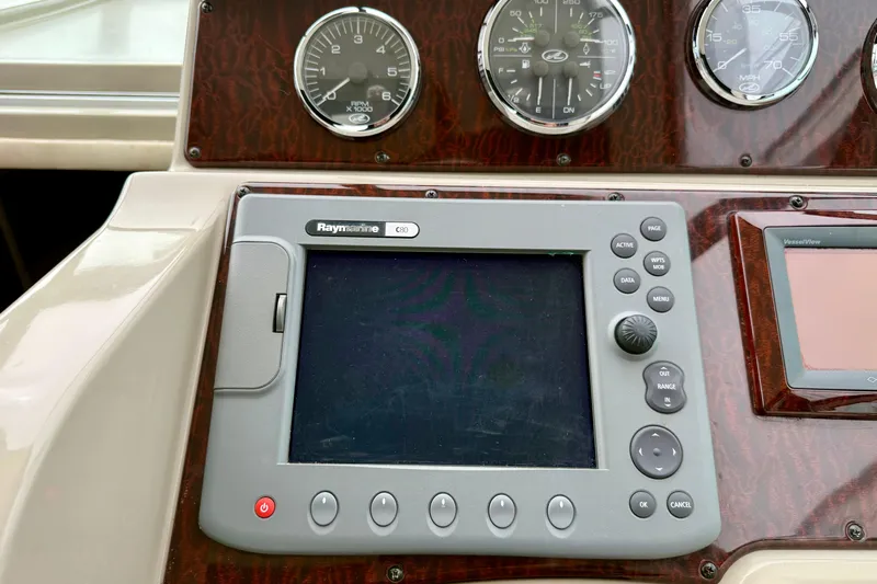 Flip Side Yacht Photos Pics Control panel of a 2010 Sea Ray 330 Sundancer with Raymarine C80 display.