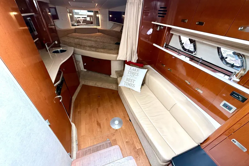 Flip Side Yacht Photos Pics Interior of 2010 Sea Ray 330 Sundancer yacht with cozy seating and modern amenities.